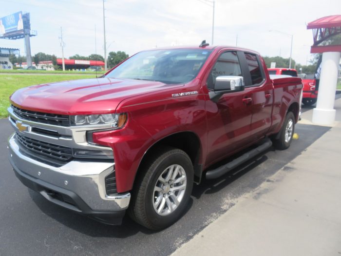 2019 Chevy Silverado with LEER 700 Tonneau, Blackout Nerf Bars, Hitch, Tint. Call TopperKING in Brandon, FL 813-689-2449 or Clearwater, FL 727-530-9066!