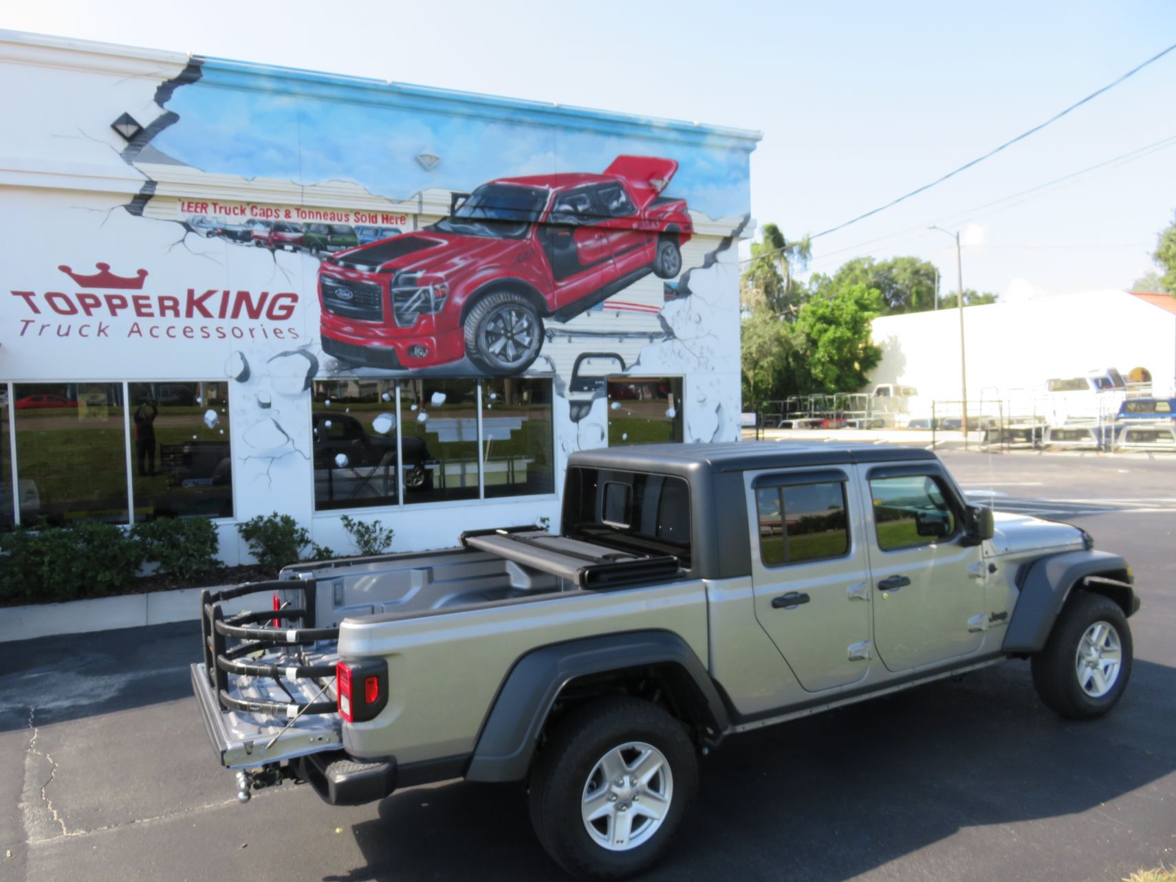 2020 Jeep Gladiator with Tonneau, BedXTender, Vent Visors, Bug Guard by TopperKING in Brandon, FL 813-689-2449 or Clearwater, FL 727-530-9066. Call today!