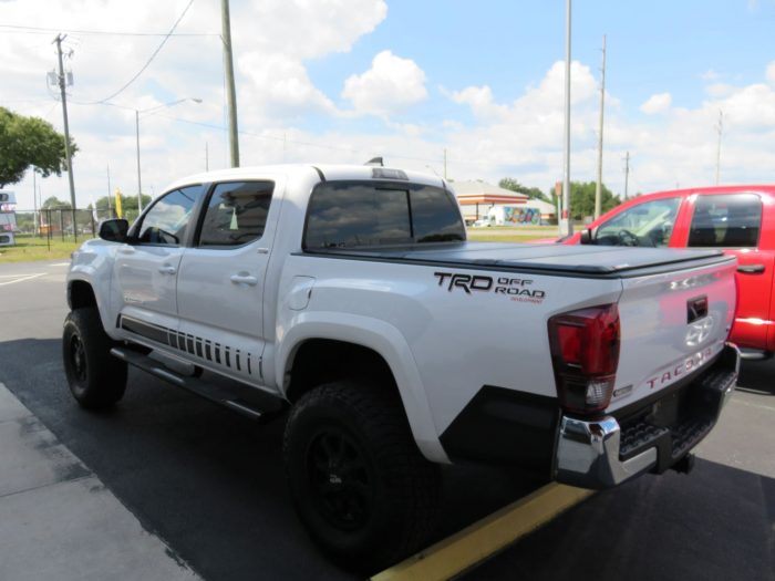 2019 Toyota Tacoma with LEER 350M, Nerf Bars, Hitch, Graphics, Bedliner by TopperKING in Brandon, FL 813-689-2449 or Clearwater FL 727-530-9066. Call today!