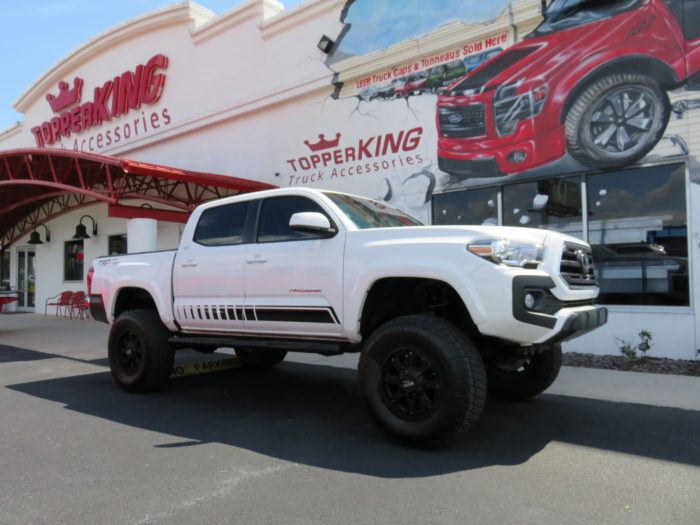 2019 Toyota Tacoma with LEER 350M, Nerf Bars, Hitch, Graphics, Bedliner by TopperKING in Brandon, FL 813-689-2449 or Clearwater FL 727-530-9066. Call today!