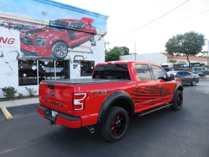 2019 Ford F150 with LEER 350M Custom Graphics, Fender Flares, Nerf Bars by TopperKING in Brandon, FL 813-689-2449 or Clearwater, FL 727-530-9066. Call now!