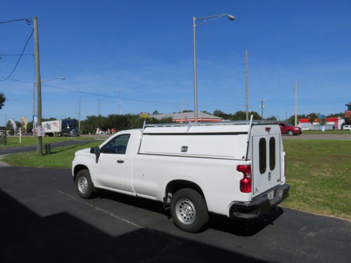 2020 Chevy Silverado with LEER DCC Construction topper, Hitch, Roof Racks installed by TopperKING Brandon 813-689-2449 or Clearwater 727-530-9066. Call now!