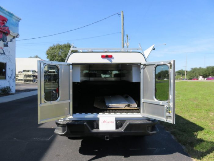 2020 Chevy Silverado with LEER DCC Construction topper, Hitch, Roof Racks installed by TopperKING Brandon 813-689-2449 or Clearwater 727-530-9066. Call now!