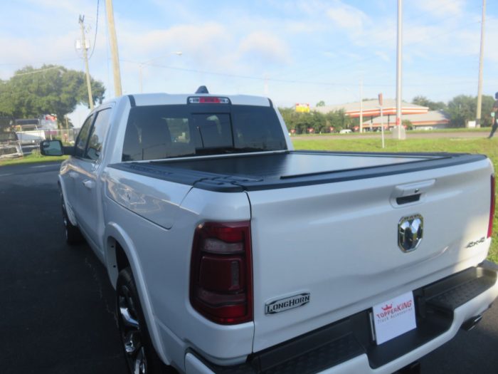 2020 Dodge Ram with Full Metal JackRabbit Tonneau, Chrome. Tint Hitch, by TopperKING in Brandon, FL 813-689-2449 or Clearwater, FL 727-530-9066. Call Today!