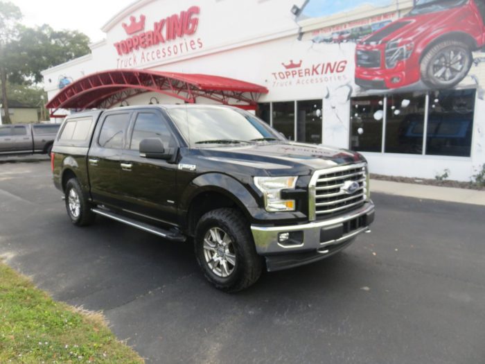 2019 Black Ford F150 with LEER 100XR, Nerf Bars, Tint, and Hitch by TopperKING in Brandon, FL 813-689-2449 or Clearwater, FL 727-530-9066. Call today!