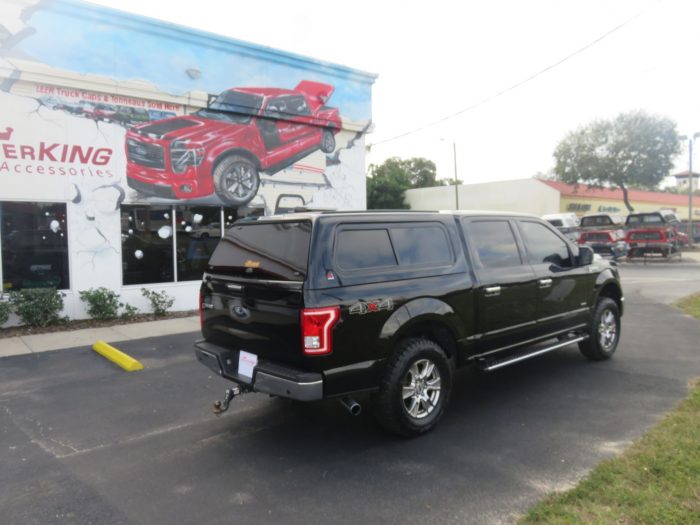2019 Black Ford F150 with LEER 100XR, Nerf Bars, Tint, and Hitch by TopperKING in Brandon, FL 813-689-2449 or Clearwater, FL 727-530-9066. Call today!