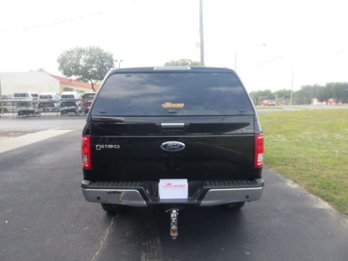 2019 Black Ford F150 with LEER 100XR, Nerf Bars, Tint, and Hitch by TopperKING in Brandon, FL 813-689-2449 or Clearwater, FL 727-530-9066. Call today!