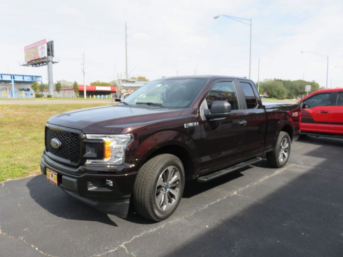 2020 Ford F150 with LEER 550 Fiberglass Lid, Running Boards, Tint, Hitch by TopperKING in Brandon, FL 813-689-2449 or Clearwater, FL 727-530-9066. Call Now!