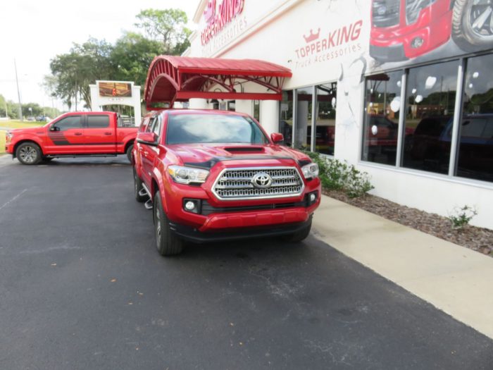 2020 Toyota Tacoma with LEER 100XR, Nerf Bars, Bug Guard, Vent Visors, Tint, Hitch by TopperKING Brandon 813-689-2449 or Clearwater 727-530-9066. Call Now!