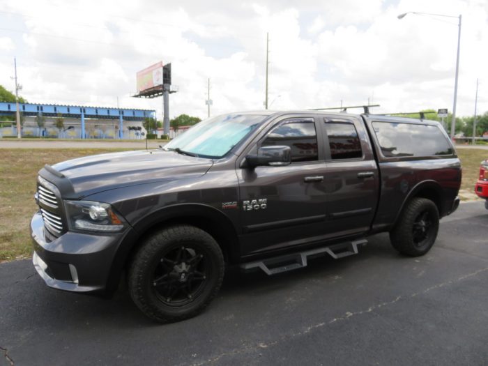 2014 Dodge RAM with LEER 100XQ, Roof Racks, Vent Visors, Bug Guard, Side Steps, and Tint. Call TopperKING in Brandon 813-689-2449 or Clearwater 727-530-9066