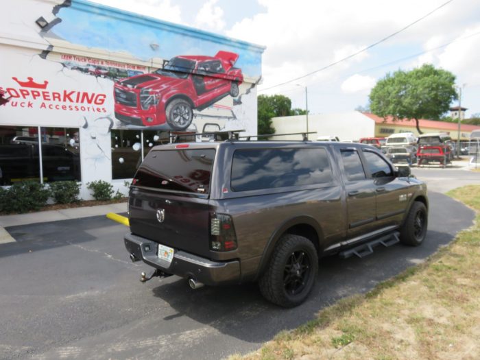 2014 Dodge RAM with LEER 100XQ, Roof Racks, Vent Visors, Bug Guard, Side Steps, and Tint. Call TopperKING in Brandon 813-689-2449 or Clearwater 727-530-9066