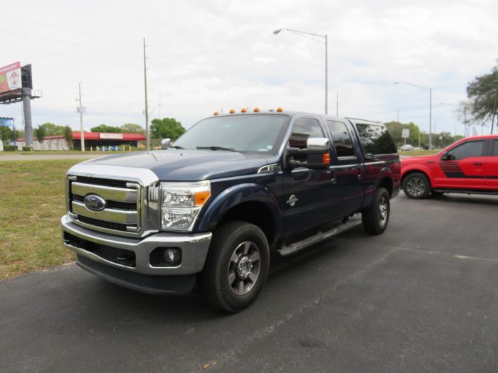 2017 F250 with LEER 100XQ Fibergalss Topper, Blacked Out Nerf Bars, Tint, Hitch by TopperKING in Brandon 813-689-2449 or Clearwater 727-530-9066. Call Now!