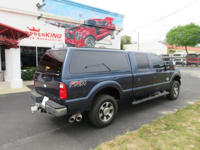 2017 F250 with LEER 100XQ Fibergalss Topper, Blacked Out Nerf Bars, Tint, Hitch by TopperKING in Brandon 813-689-2449 or Clearwater 727-530-9066. Call Now!