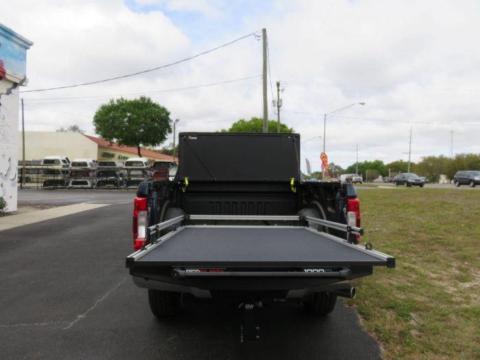 2019 F250 with LEER 350M Trifold Tonneau, BedSlide, Hood Guard, Vent Visors, LOADED! Call TopperKING in Brandon 813-689-2449 or Clearwater 727-530-9066.