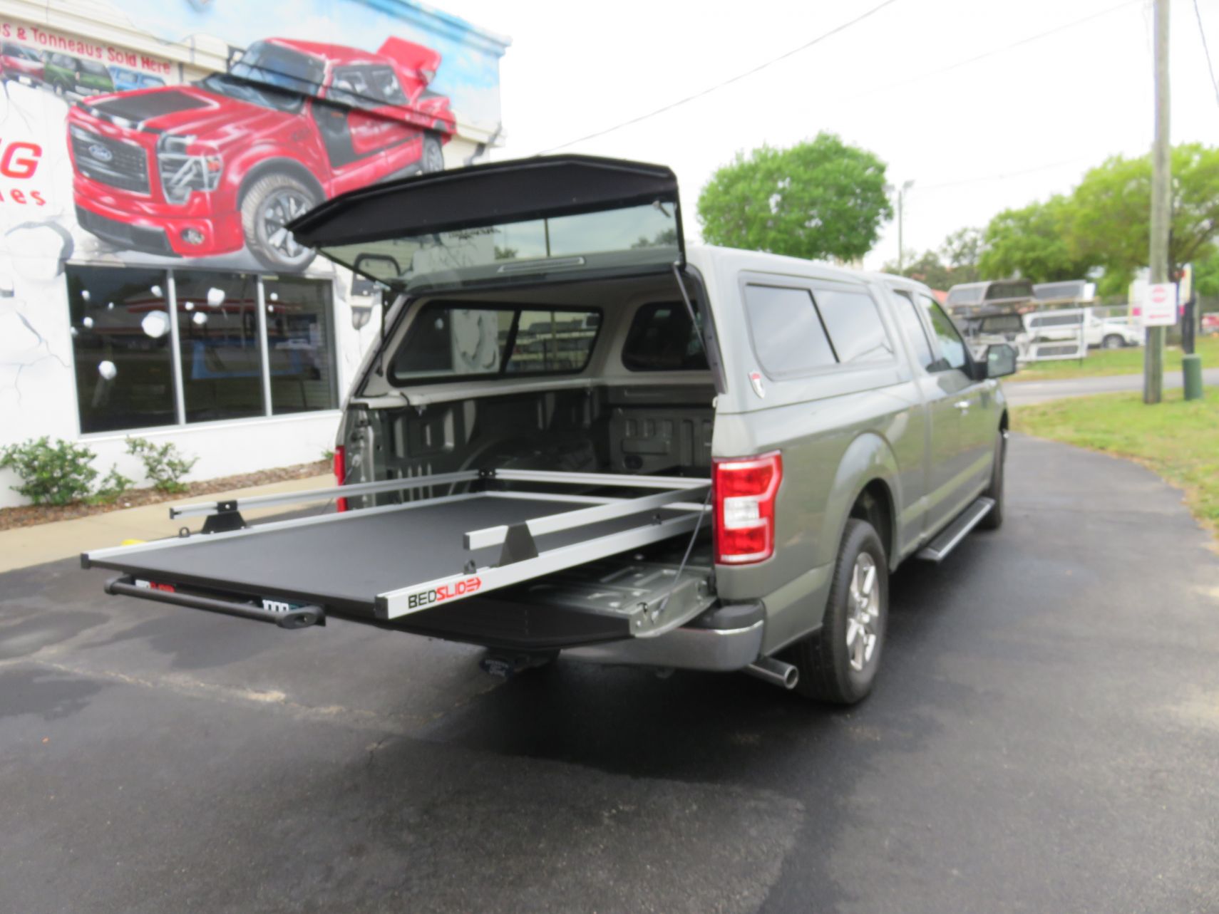 2019 Ford F150 with TK Defender Fiberglass Topper, Bedslide, Running Boards, Tint, Hitch. Call TopperKING Brandon 813-689-2449 or Clearwater FL 727-530-9066