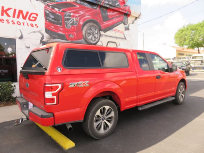 2019 Ford F150 TK Defender with Blacked Out Nerf Bars, Hitch, Tint by TopperKING in Brandon, FL 813-689-2449 or Clearwater, FL 727-530-9066. Call today!