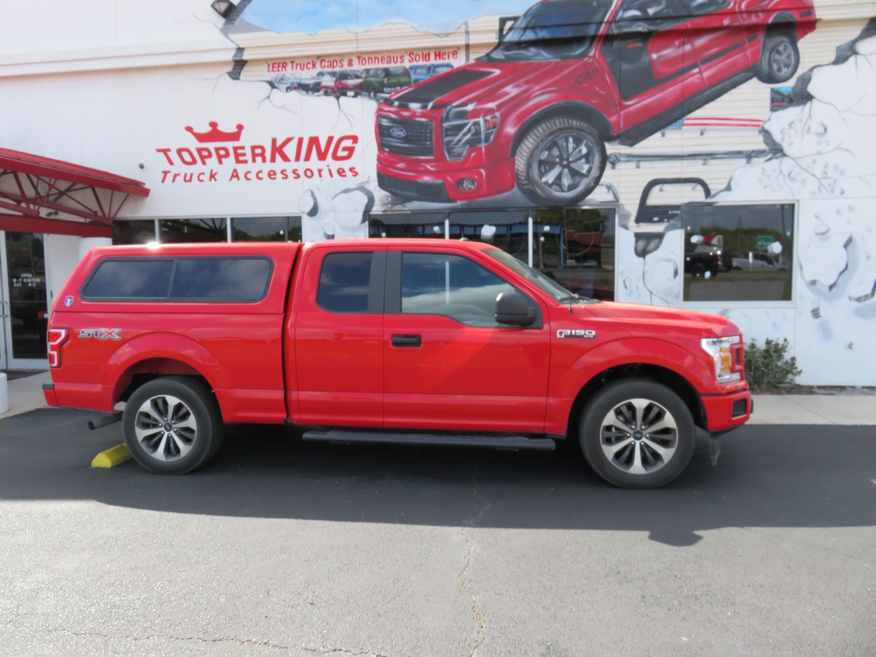 2019 Ford F150 TK Defender with Blacked Out Nerf Bars, Hitch, Tint by TopperKING in Brandon, FL 813-689-2449 or Clearwater, FL 727-530-9066. Call today!