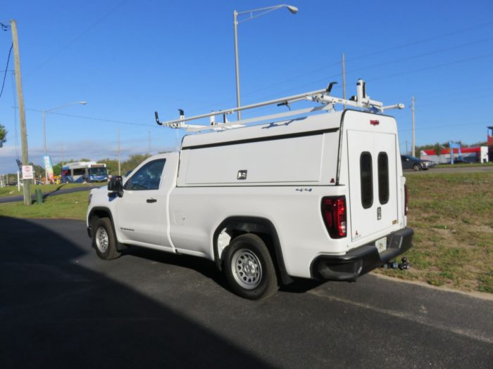 2020 White GMC Sierra with LEER DCC, Roof Racks, and Hitch by TopperKING in Brandon, FL 813-689-2449 or Clearwater, FL 727-530-9066. Call today to start!