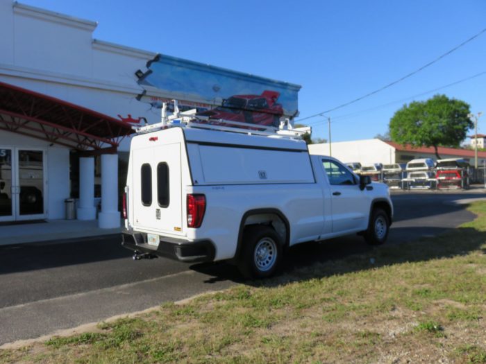 2020 White GMC Sierra with LEER DCC, Roof Racks, and Hitch by TopperKING in Brandon, FL 813-689-2449 or Clearwater, FL 727-530-9066. Call today to start!