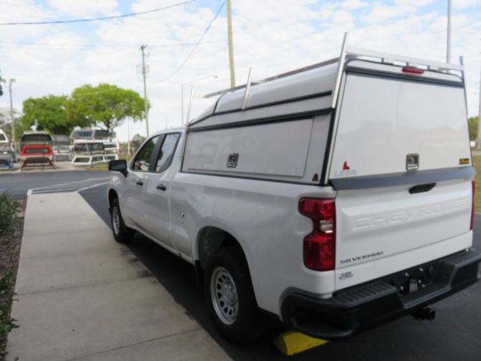 2020 Chevy Silverado with LEER DCC, Roof Racks, Hitch, and Tint by TopperKING in Brandon, FL 813-689-2449 or Clearwater, FL 727-530-9066. Call today!