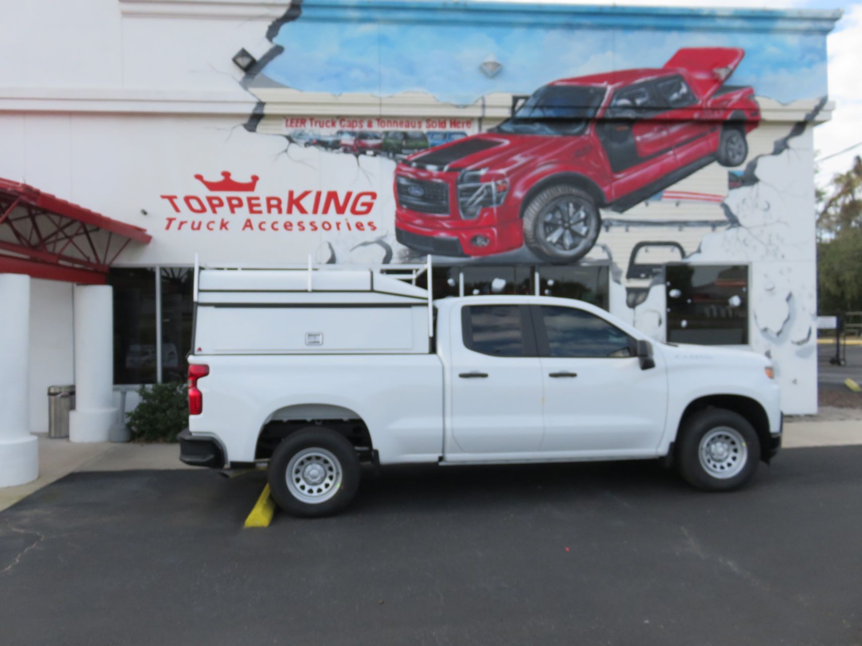 2020 Chevy Silverado with LEER DCC, Roof Racks, Hitch, and Tint by TopperKING in Brandon, FL 813-689-2449 or Clearwater, FL 727-530-9066. Call today!