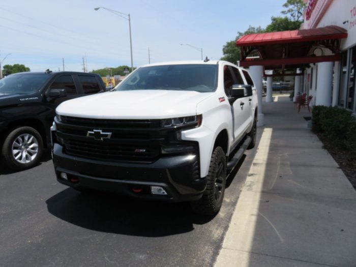 2020 Chevy Silverado with LEER 100XL, Roof Racks, Nerf Bars, Hitch by TopperKING Brandon 813-689-2449 or Clearwater 727-530-9066. Call Today!