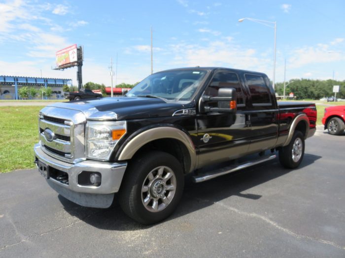 2013 Ford F350 with LEER 650M Folding Tonneau, Nerf Bars, Chrome Bug Shield, Hitch,Tint by TopperKING Brandon 813-689-2449 or Clearwater 727-530-9066. Call!