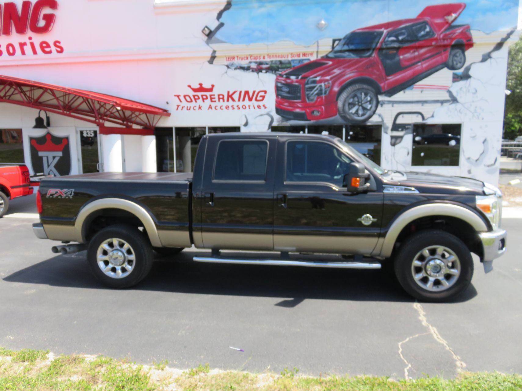 2013 Ford F350 with LEER 650M Folding Tonneau, Nerf Bars, Chrome Bug Shield, Hitch,Tint by TopperKING Brandon 813-689-2449 or Clearwater 727-530-9066. Call!