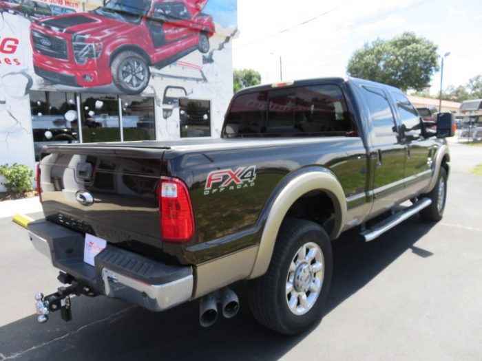 2013 Ford F350 with LEER 650M Folding Tonneau, Nerf Bars, Chrome Bug Shield, Hitch,Tint by TopperKING Brandon 813-689-2449 or Clearwater 727-530-9066. Call!