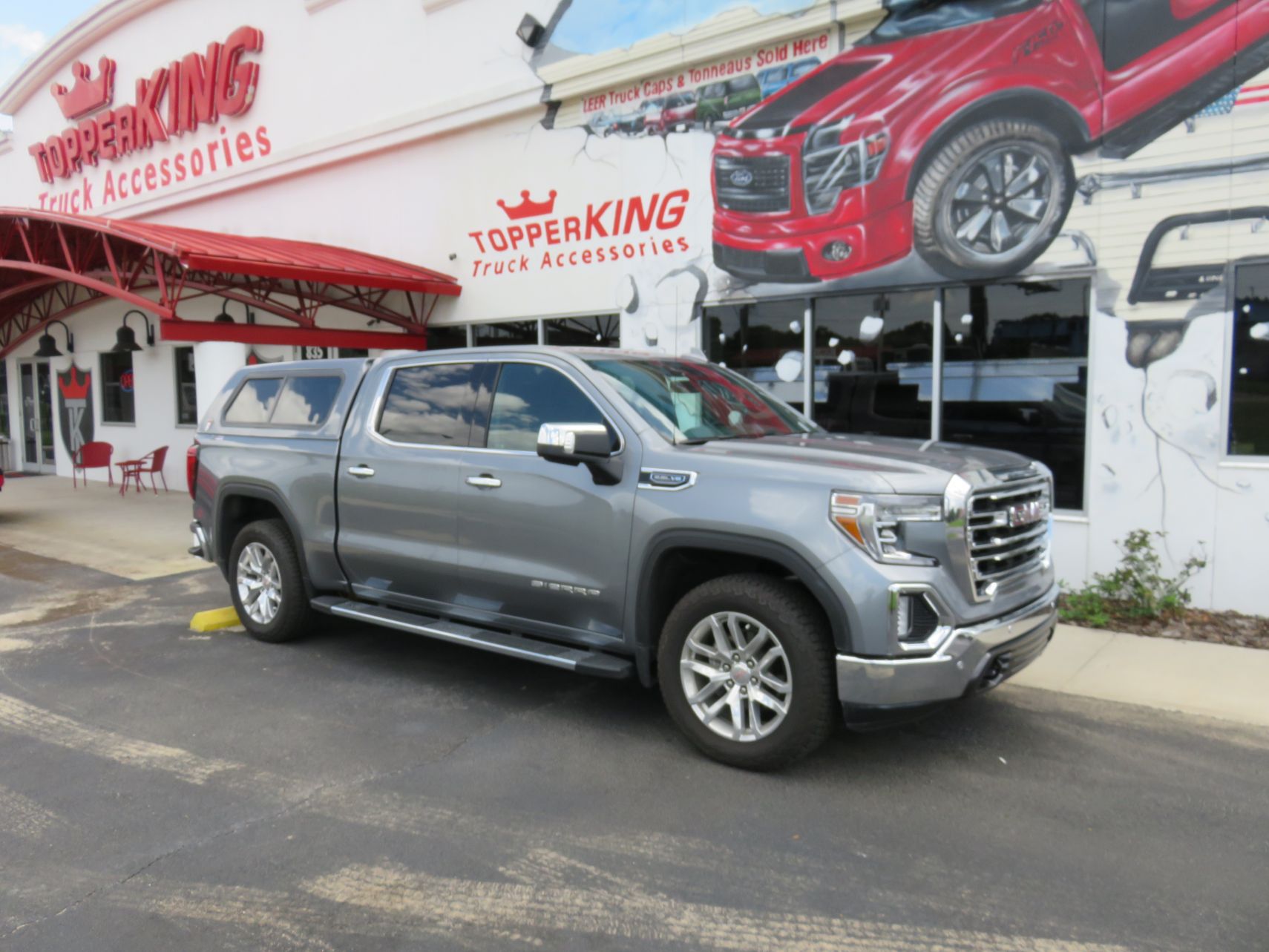 2020 GMC Sierra with TK Defender Fiberglass Topper, Nerf Bars, Chrome, Tint, Hitch by TopperKINGBrandon 813-689-2449 or Clearwater FL 727-530-9066. Call Us!