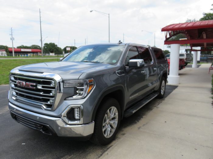 2020 GMC Sierra with TK Defender Fiberglass Topper, Nerf Bars, Chrome, Tint, Hitch by TopperKINGBrandon 813-689-2449 or Clearwater FL 727-530-9066. Call Us!