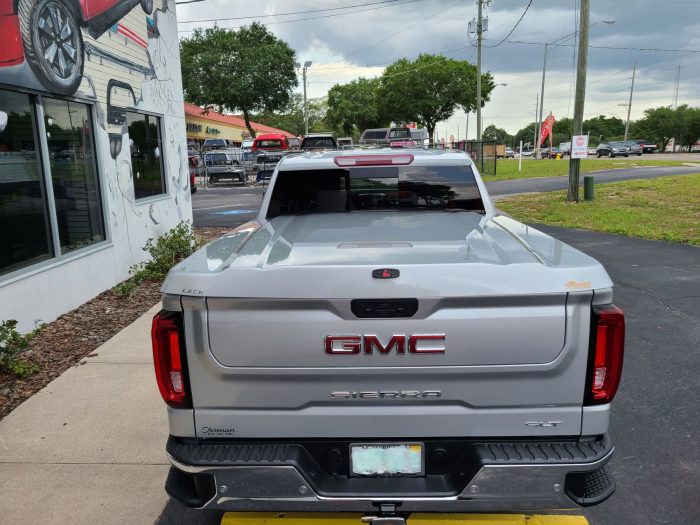 2020 GMC Sierra with LEER 700 Lid, Vent Visors, Bug Guard, Running Boards, Hitch, Tint by TopperKING Brandon 813-689-2449 or Clearwater 727-530-9066. Call!