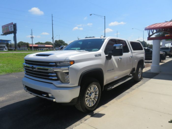 2020 Chevy Silverado with LEER 100XL, Nerf Bars, Chrome, Hitch, Tint by TopperKING in Brandon, FL 813-689-2449 or Clearwater, FL 727-530-9066. Call Today!