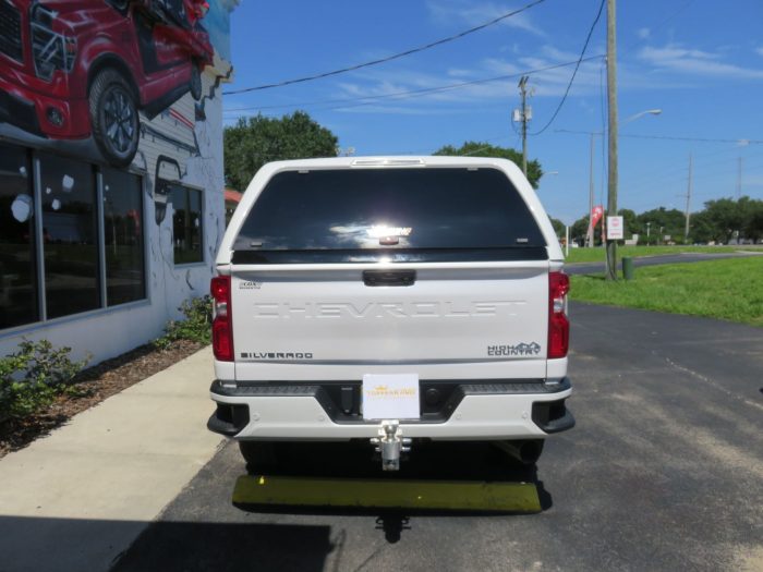 2020 Chevy Silverado with LEER 100XL, Nerf Bars, Chrome, Hitch, Tint by TopperKING in Brandon, FL 813-689-2449 or Clearwater, FL 727-530-9066. Call Today!