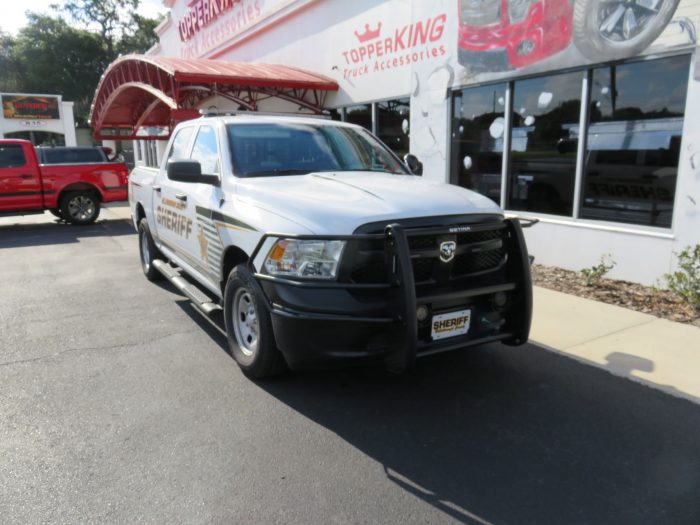 2020 Dodge RAM with LEER 350M, Grill Guard, Nerf Bars, Hitch, Tint by TopperKING in Brandon, FL 813-689-2449 or Clearwater, FL 727-530-9066. Call today!