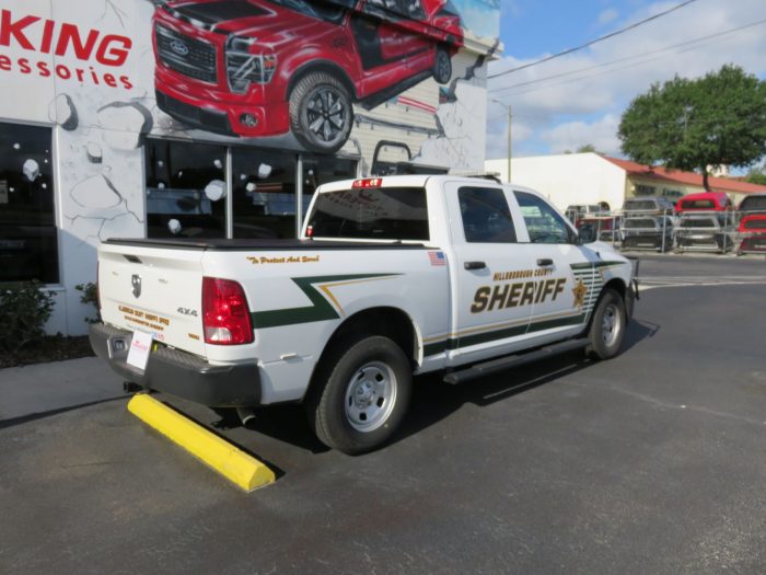 2020 Dodge RAM with LEER 350M, Grill Guard, Nerf Bars, Hitch, Tint by TopperKING in Brandon, FL 813-689-2449 or Clearwater, FL 727-530-9066. Call today!