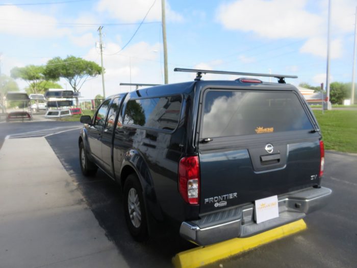 2018 Nissan Frontier with Ranch Sierra Fiberglass Topper, Roof Racks, Windoor, Tint by TopperKING Brandon 813-689-2449 or Clearwater FL 727-530-9066. Call!