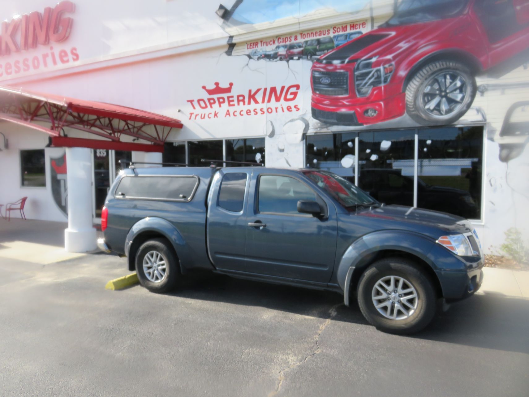 2018 Nissan Frontier with Ranch Sierra Fiberglass Topper, Roof Racks, Windoor, Tint by TopperKING Brandon 813-689-2449 or Clearwater FL 727-530-9066. Call!