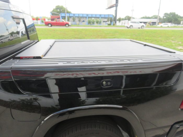 2019 Dodge RAM with Roll-n-Lock, Nerf Bars, Window Graphic, Tint, Hitch by TopperKING in Brandon FL 813-689-2449 or Clearwater, FL 727-530-9066. Call today!