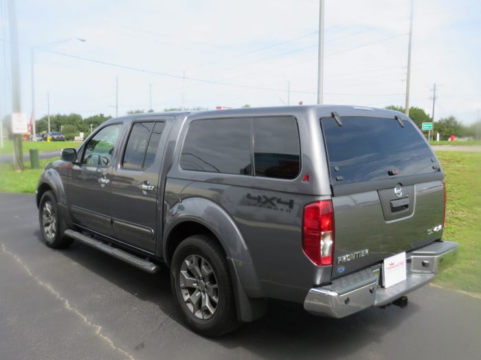 2019 Nissan Frontier with LEER 100XL Fiberglass Topper, Nerf Bars, Chrome, Hitch, Tint. Call TopperKING Brandon 813-689-2449 or Clearwater FL 727-530-9066.