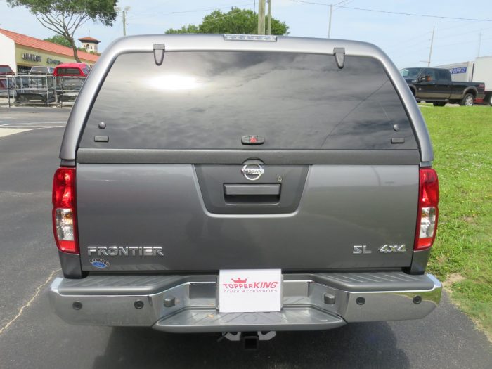 2019 Nissan Frontier with LEER 100XL Fiberglass Topper, Nerf Bars, Chrome, Hitch, Tint. Call TopperKING Brandon 813-689-2449 or Clearwater FL 727-530-9066.