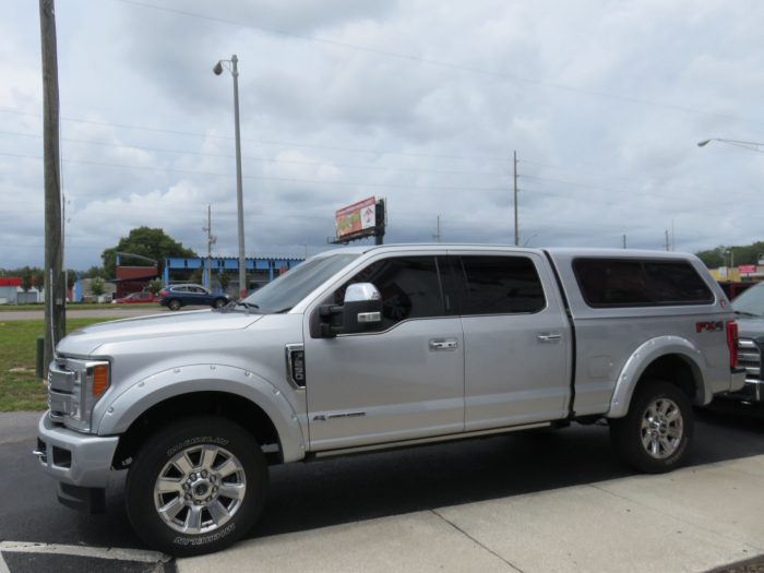 Ford F250 TK Defender and Retractable Step, Fender Flares, Chrome Accessories, Tint, Hitch. Call TopperKING Brandon 813-689-2449 or Clearwater 727-530-9066.