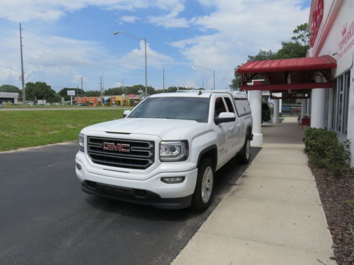 GMC Sierra with LEER DCC Commercial Topper, Side Access Doors, Ladder Rack, Tint, Hitch, Call TopperKING Brandon 813-689-2449 or Clearwater FL 727-530-9066.