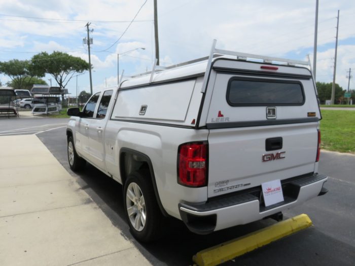 GMC Sierra with LEER DCC Commercial Topper, Side Access Doors, Ladder Rack, Tint, Hitch, Call TopperKING Brandon 813-689-2449 or Clearwater FL 727-530-9066.