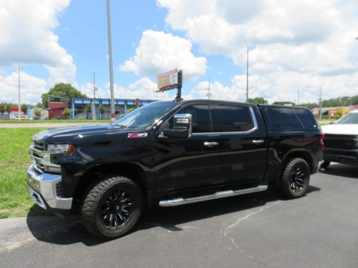 2020 Chevy with LEER 100XL, Nerf Bars, Chrome Accessories, Tint, Hitch by TopperKING in Brandon, FL 813-689-2449 or Clearwater, FL 727-530-9066. Call today!