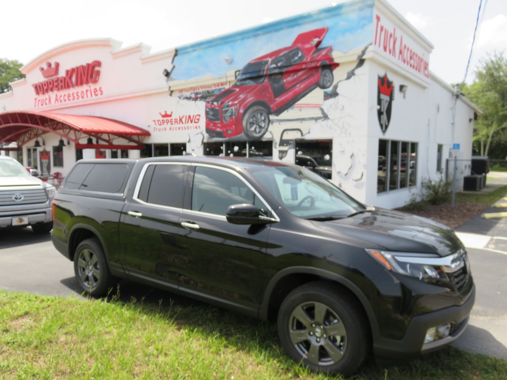 2020 Honda Ridgeline with LEER 100XL, Chrome Accessories, Tint, Hitch by TopperKING in Brandon, FL 813-689-2449 or Clearwater, FL 727-530-9066. Call today!