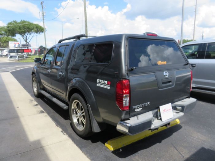2006 Nissan Frontier with Ranch Sierra Fiberglass Topper, Nerf Bars, Bug Guard, Tint. Call TopperKING in Brandon 813-689-2449 or Clearwater FL 727-530-9066.