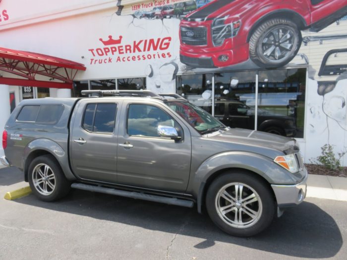 2006 Nissan Frontier with Ranch Sierra Fiberglass Topper, Nerf Bars, Bug Guard, Tint. Call TopperKING in Brandon 813-689-2449 or Clearwater FL 727-530-9066.