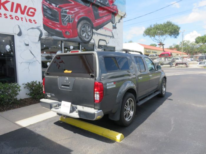 2006 Nissan Frontier with Ranch Sierra Fiberglass Topper, Nerf Bars, Bug Guard, Tint. Call TopperKING in Brandon 813-689-2449 or Clearwater FL 727-530-9066.