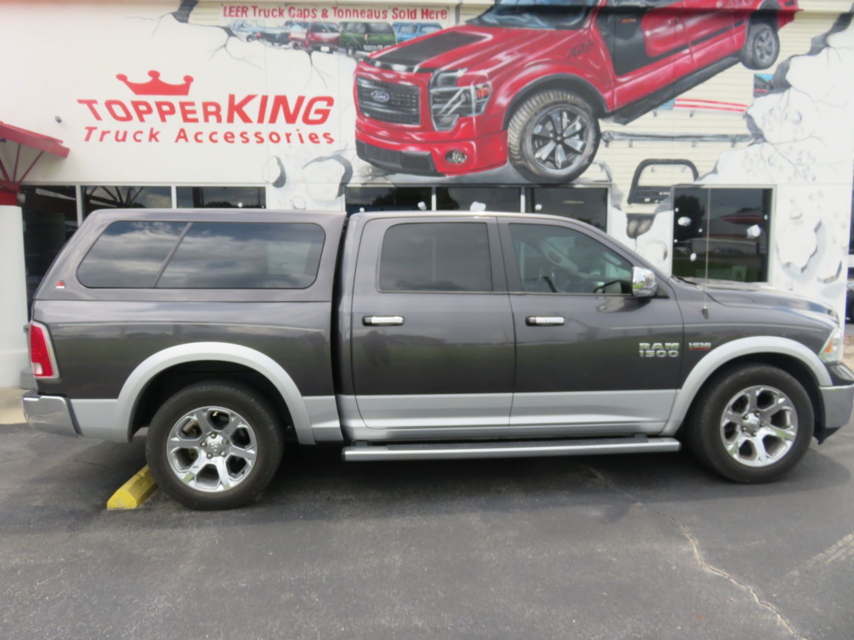 2018 Dodge RAM with LEER 100XL Fiberglass Topper, Nerf Bars, Chrome, Tint, Hitch. Call TopperKING Brandon 813-689-2449 or Clearwater, FL 727-530-9066.